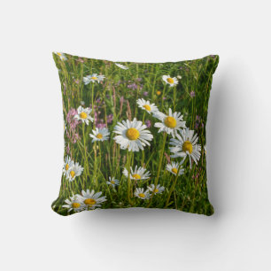Coussin Daisy sur un pré