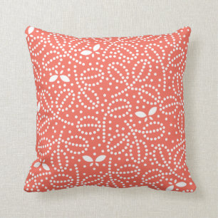 Coussin de papillon dans le corail