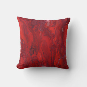 Coussin de texture marbrée rouge foncé