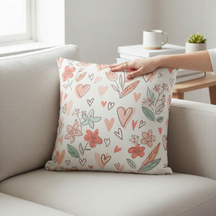 Coussin décoratif à coeur floral rose