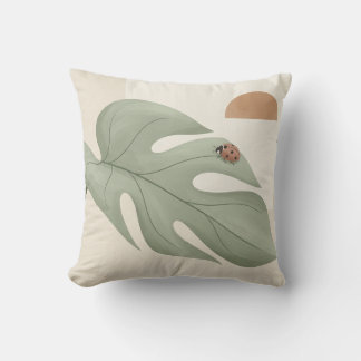 Coussin décoratif feuille de Monstera et coccinell