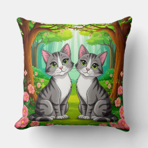 Coussin Deux chats adorables assis dans une forêt vibrante