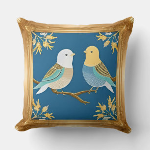 Coussin Deux oiseaux colorés dans un cadre doré orné