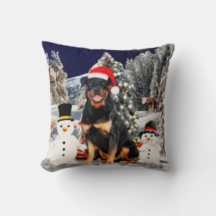 Coussin Doigt Rottweiler en neige avec le chapeau du Père 
