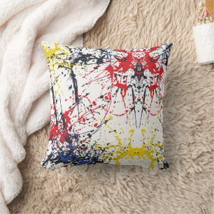 Coussin Éclatement coloré : une pièce de théâtre aléatoire