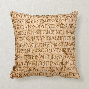 Coussin écriture grecque ancienne ciselée sur pierre