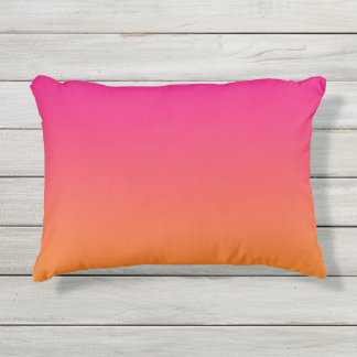 Coussin extérieur rose et orange d'Ombre
