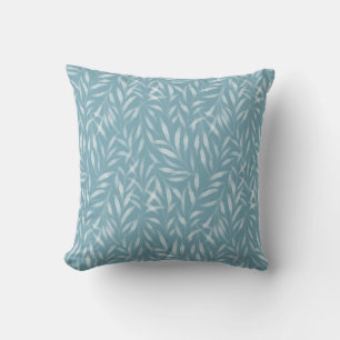 Coussin Feuilles à l'aquarelle sur fond bleu