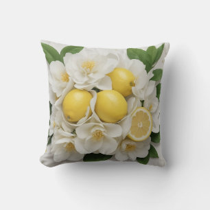 Coussin Fleurs blanches, citrons et feuilles vertes sur fo