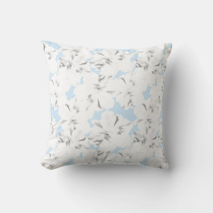Coussin Fleurs blanches sur bleu clair.