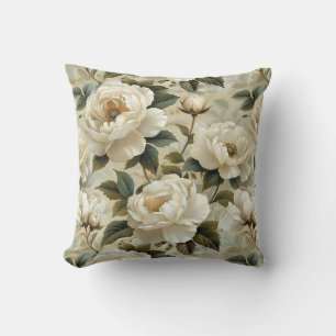 Coussin Fleurs blanches sur un arrière - plan crème.