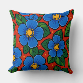 Coussin Fleurs bleues et feuilles vertes sur fond rouge