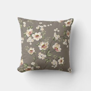 Coussin fleurs crème mignonnes avec motif feuille vert sur