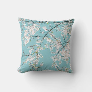 Coussin Fleurs de cerisiers : tendance florale turquoise