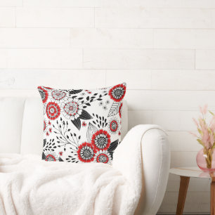 Coussin Fleurs de gribouillis et feuilles en rouge et noir