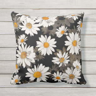 Coussin Fleurs de marguerite blanche sur le noir