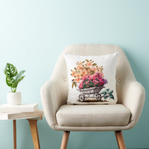 Coussin Fleurs roses pêche dans un baril floral à roue bla