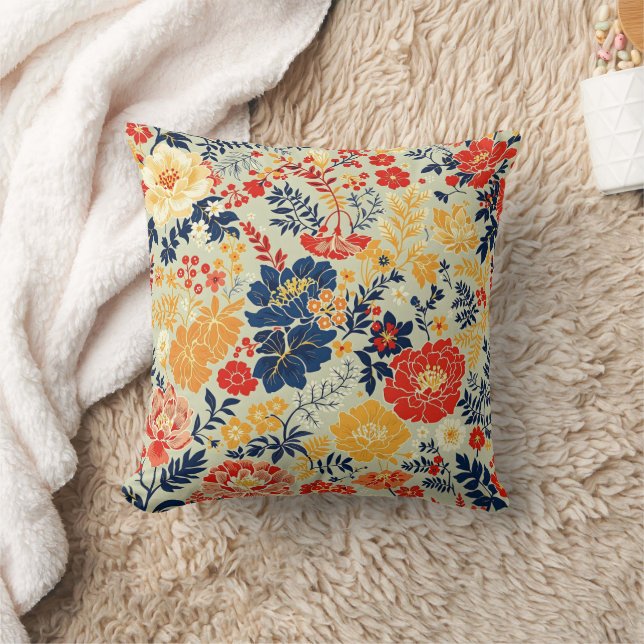Coussin Flore vive rouge, jaune et bleu sur blanc (Couverture)