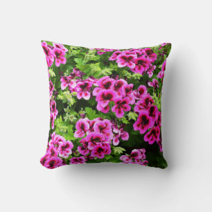 Coussin "Flores vives : Geraniums roses chauds sur Bush lu