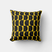 Coussin géométrique noir et jaune à orbite dorée