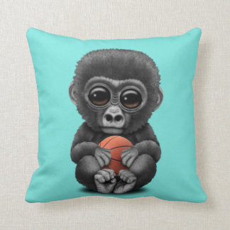 Coussin Gorille mignon de bébé jouant avec le basket-ball