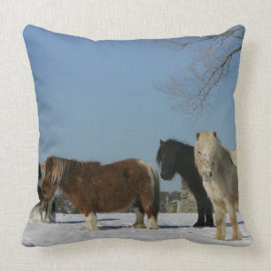 Coussin Groupe de chevaux miniatures dans la neige