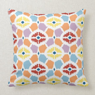 Coussin Ikat coloré de diamants géométrique