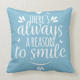 Coussin Il y a toujours une raison de sourire carreau