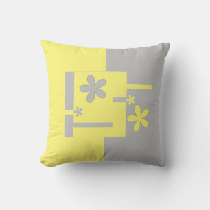 Coussin imprimé gris et jaune,