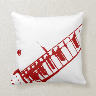 Coussin instrument blanc et rouge de timbre de cou de
