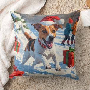 Coussin Jack Russell courant dans la neige avec un chapeau