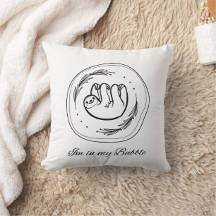 Coussin 'Je suis dans ma bulle' Black Outline dans l'oreil