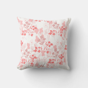 Coussin jeté rose