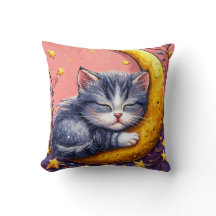 Joli chat endormi reposant sur un croissant de lun
