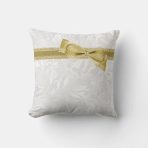 Coussin Joli faux nœud papillon et ruban et damas doré