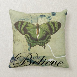 Coussin Le papillon vert croient le carreau