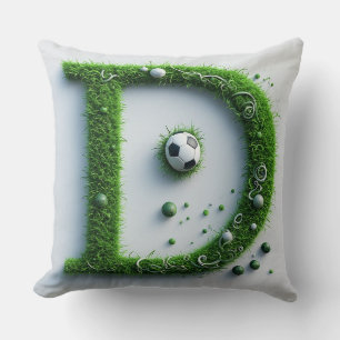 Coussin Lettre D en topiaire d'herbe verte avec ballon de