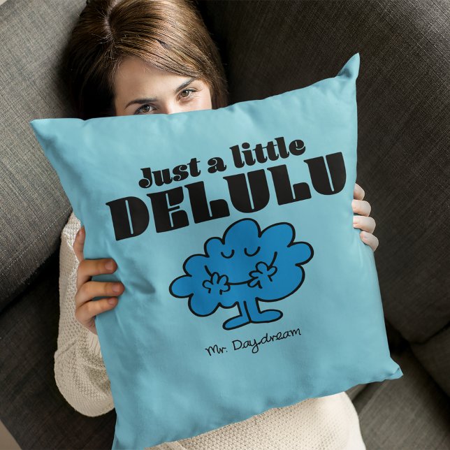 Coussin M. Rêvasseur Juste un peu Délirant (Person holding throw pillow)