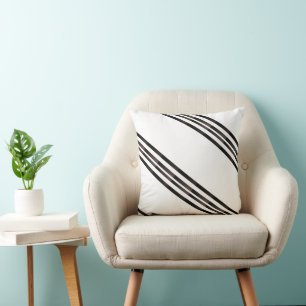 Coussin marron et blanc à rayures