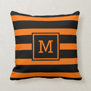 Coussin Monogramme rayé orange et noir lumineux