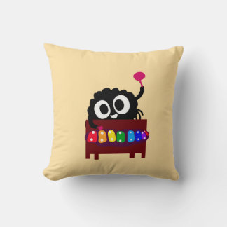 Coussin Monster joue le Xylophone