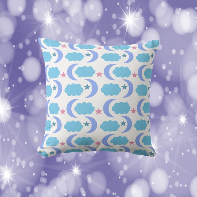 Coussin Moon Cloud Stars Motif Purple Blue (A throw pillow with a moon, cloud and star pattern done in blue, purple and pink.)