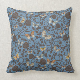Coussin motif avec les roses et le papillon