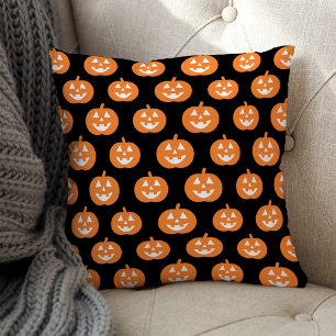 Coussin Motif classique de citrouille orange sur fond noir