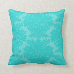 Coussin motif damassé bleu aqua gras orné