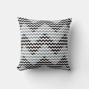 Coussin motif de bandes de chevrons géométriques en noir e