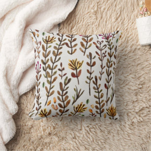 Coussin motif fleur sauvage et feuille