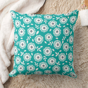 Coussin Motif floral blanc sur fond turquoise