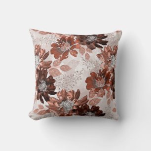 Coussin Motif floral gris-marron.