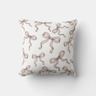 Coussin Nœuds de ruban rose tendance mignons soulignés en 